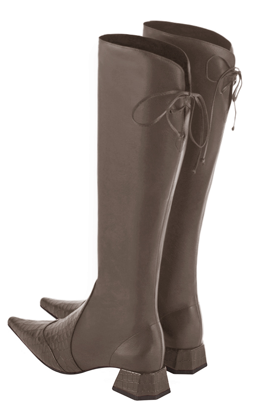 French elegance and refinement for these taupe brown knee-high boots, with laces at the back, 
                available in many subtle leather and colour combinations. Pretty boot adjustable to your measurements in height and width
Customizable or not, in your materials and colors.
Its half side zip and rear opening will leave you very comfortable.
For pointed toe fans. 
                Made to measure. Especially suited to thin or thick calves.
                Matching clutches for parties, ceremonies and weddings.   
                You can customize these knee-high boots to perfectly match your tastes or needs, and have a unique model.  
                Choice of leathers, colours, knots and heels. 
                Wide range of materials and shades carefully chosen.  
                Rich collection of flat, low, mid and high heels.  
                Small and large shoe sizes - Florence KOOIJMAN